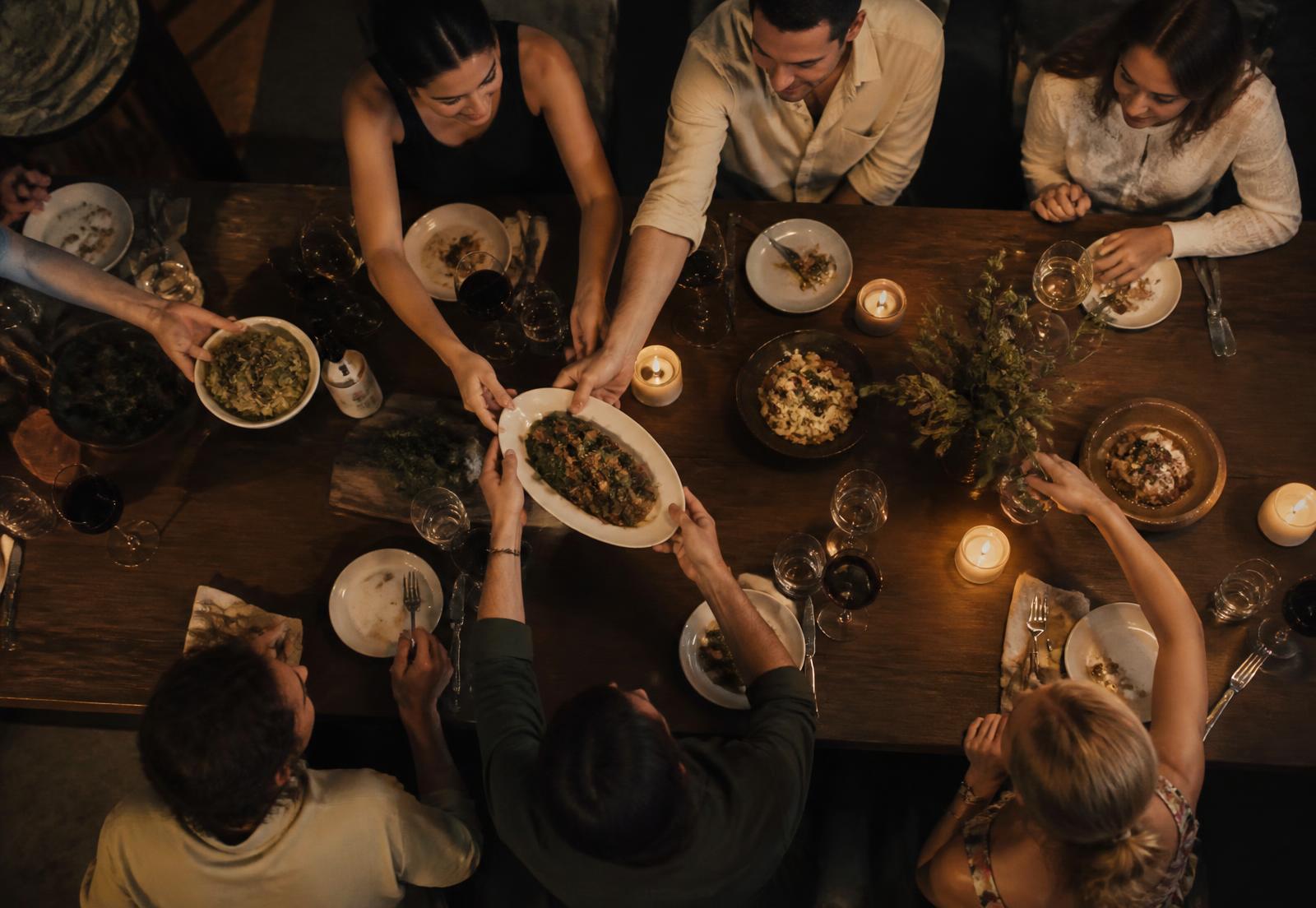 A shared table of grilled dishes at Braai Society